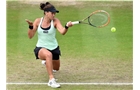 BIRMINGHAM, ENGLAND - JUNE 14: Casey Dellacqua of Australia in action against Barbora Zahlavova Strycova of Czech Republic on day six of the Aegon Classic at Edgbaston Priory Club on June 13, 2014 in Birmingham, England. (Photo by Tom/Getty Images)